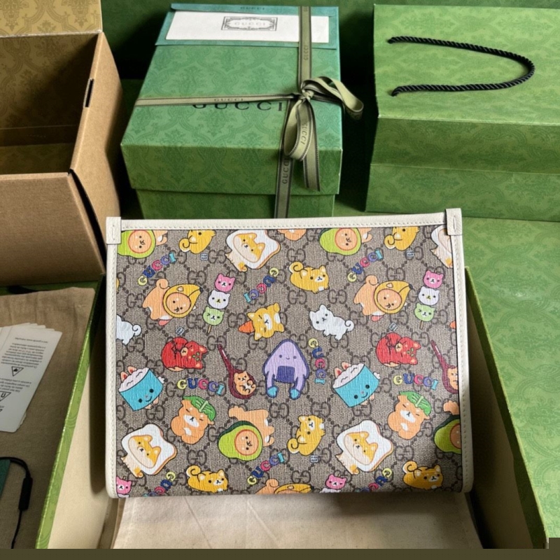 G*u*i clutch bags